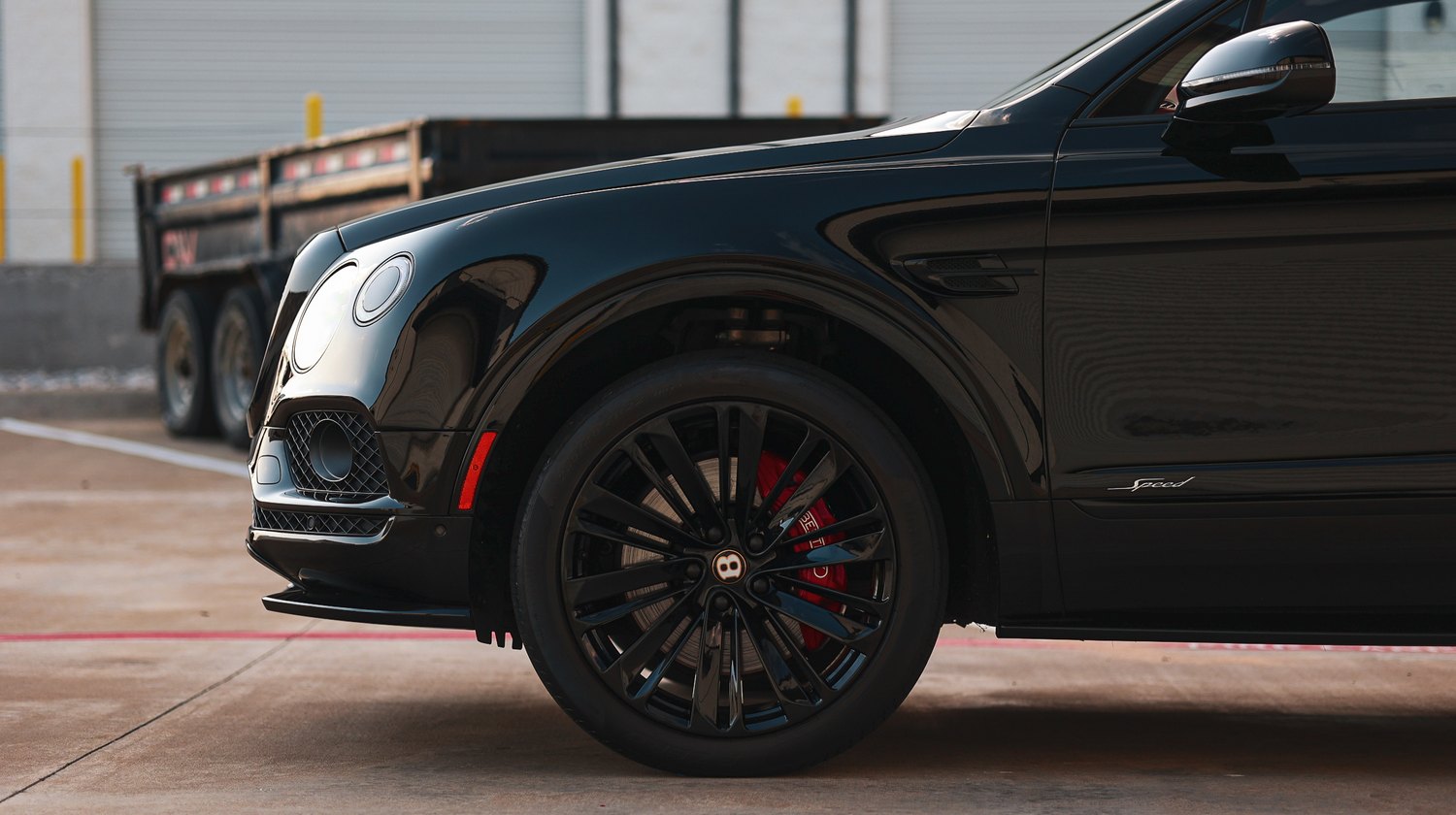Front wheel and fender of a ceramic coated Bentley Bentayga Speed