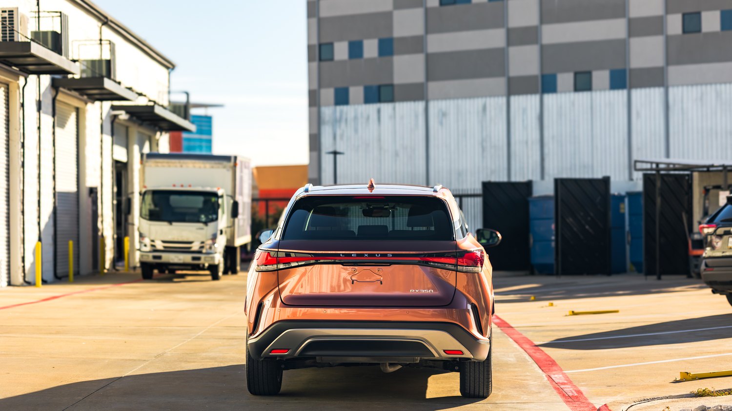 Rear view of a copper Lexus RX 350 after ceramic coating
