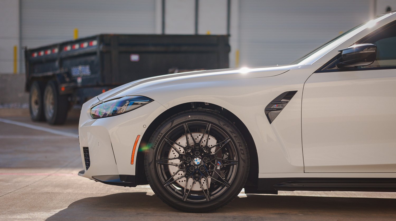 White 2025 BMW M3 G80 Competition — front wheel and fender
