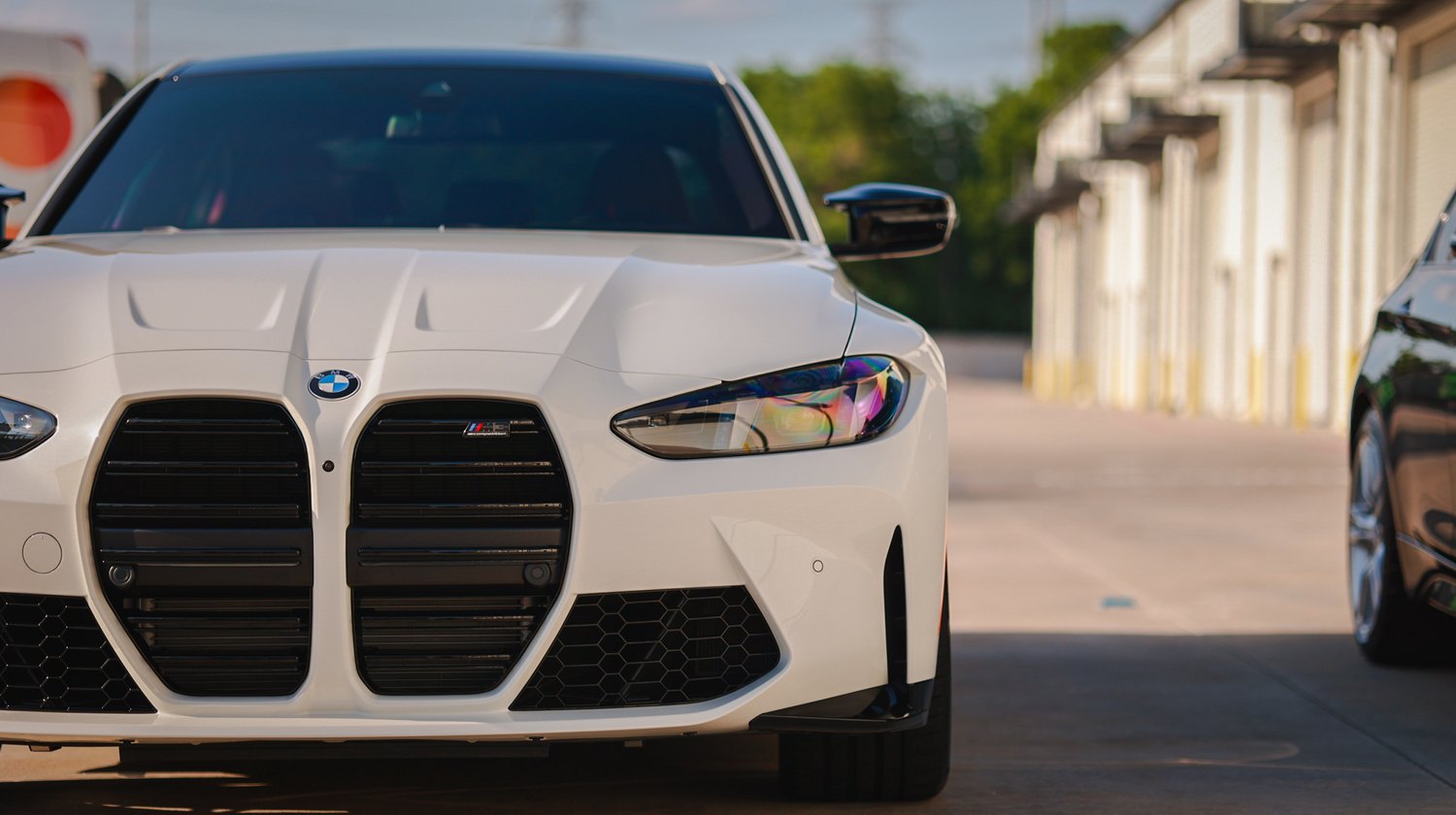 White 2025 BMW M3 G80 Competition — kidney grille and headlight