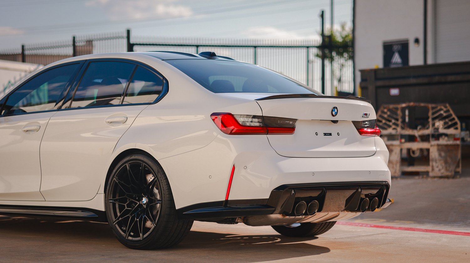 White 2025 BMW M3 G80 Competition — rear three quarter side