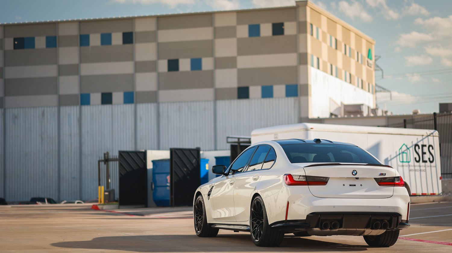 White 2025 BMW M3 G80 Competition — rear three quarter wide