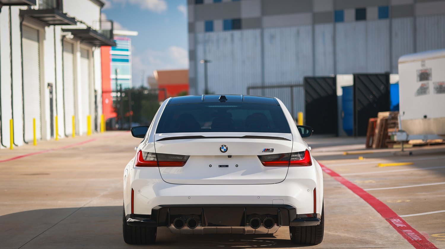 White 2025 BMW M3 G80 Competition — rear view