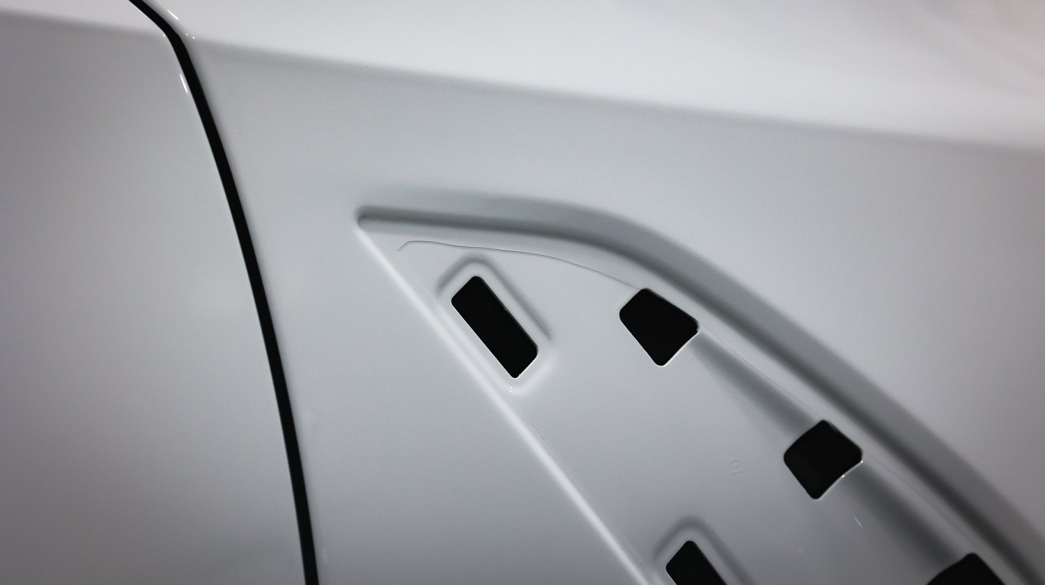 White 2025 BMW M3 G80 Competition — fender vent removed