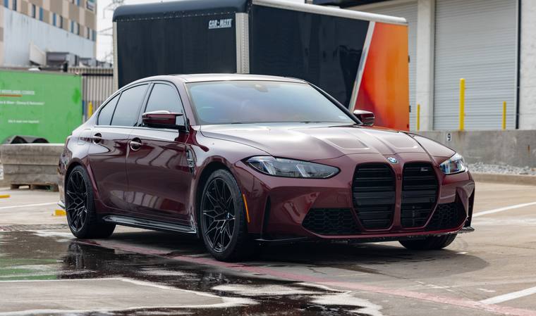 Aventurin Red BMW M3 G80 Competition paint protection film, ceramic coating — front three quarter at Humble Crew Auto Spa, Plano TX