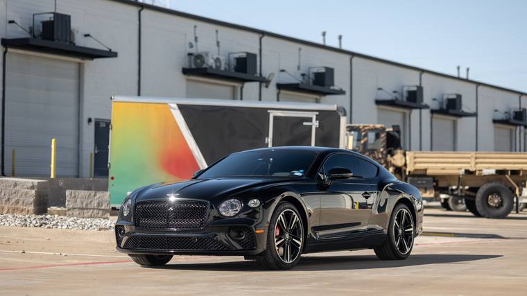 Black Bentley Continental GT paint protection film, ceramic coating, paint correction — front three quarter at Humble Crew Auto Spa, Plano TX