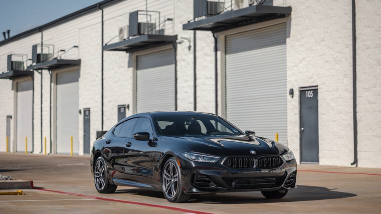 Black BMW 8 Series Gran Coupe 840i xDrive ceramic coating — front three quarter at Humble Crew Auto Spa, Plano TX