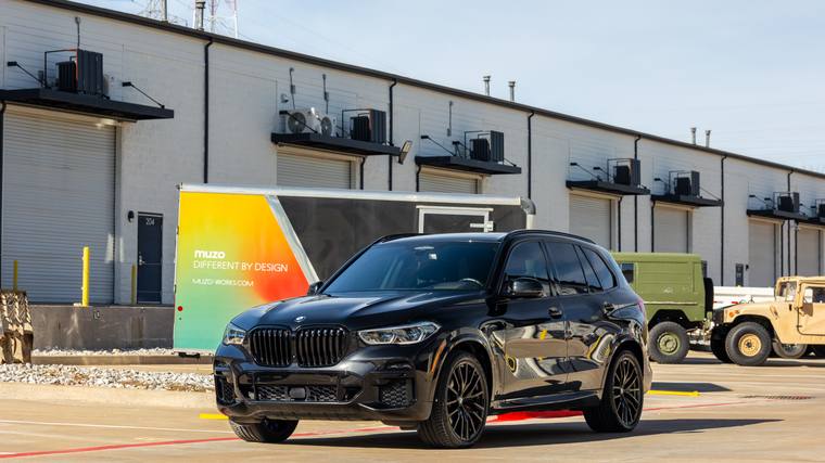 Black BMW X5 xDrive40i paint protection film, ceramic coating — front three quarter at Humble Crew Auto Spa, Plano TX