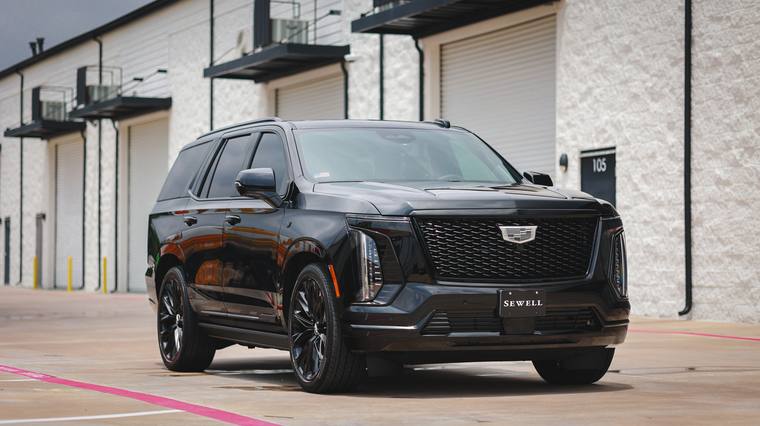 Black Cadillac Escalade Sport Platinum paint protection film, ceramic coating — front three quarter at Humble Crew Auto Spa, Plano TX