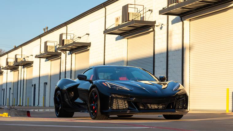 Black Chevrolet Corvette C8 E-Ray paint protection film, ceramic coating — front three quarter at Humble Crew Auto Spa, Plano TX