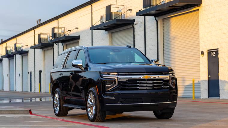 Black Chevrolet Tahoe ceramic coating, paint correction — front three quarter at Humble Crew Auto Spa, Plano TX