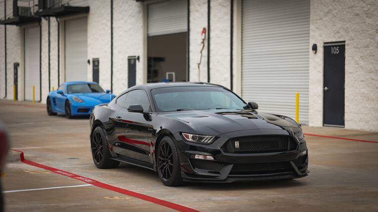 Black Ford Mustang Shelby GT350 paint protection film, ceramic coating — front three quarter at Humble Crew Auto Spa, Plano TX
