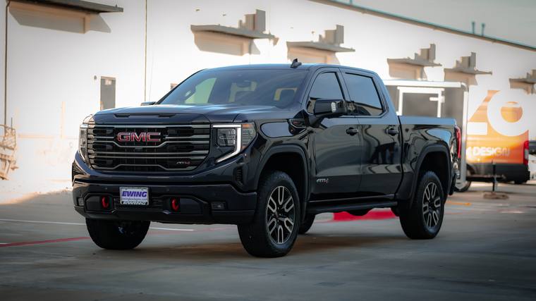 Black GMC Sierra 1500 AT4 paint protection film, ceramic coating — front three quarter at Humble Crew Auto Spa, Plano TX