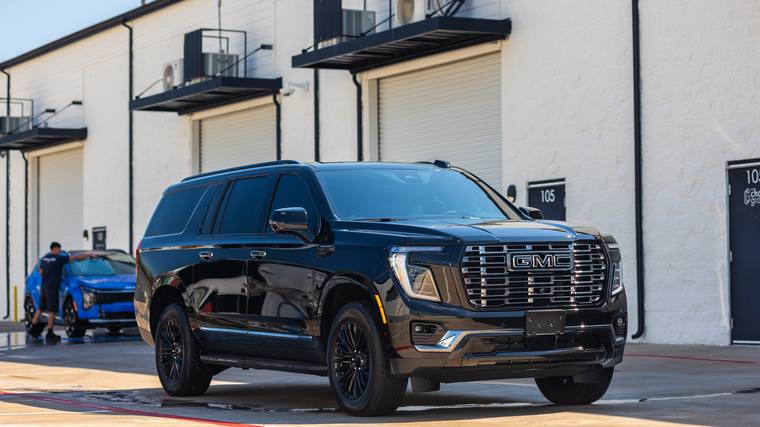 Black GMC Yukon XL Denali Ultimate ceramic coating — front three quarter at Humble Crew Auto Spa, Plano TX
