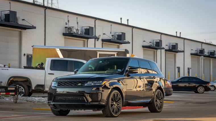 Black Land Rover Range Rover Sport HSE P525 ceramic coating, paint correction — front three quarter at Humble Crew Auto Spa, Plano TX