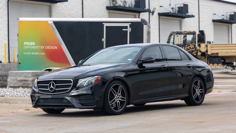 Black Mercedes-Benz E-Class E 300 AMG Line ceramic coating, paint correction — front three quarter at Humble Crew Auto Spa, Plano TX