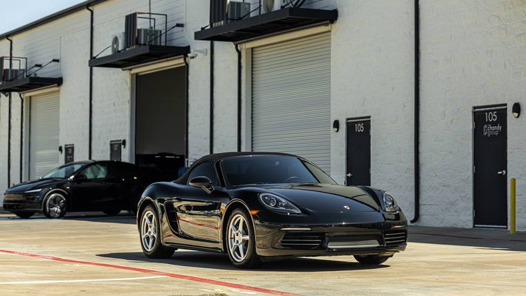 Black Porsche 718 Boxster paint protection film, ceramic coating, paint correction — front three quarter at Humble Crew Auto Spa, Plano TX