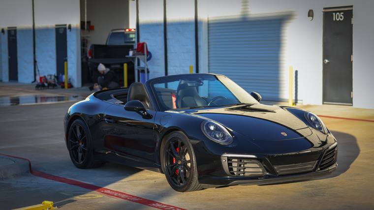 Black Porsche 911 991.2 Carrera S Cabriolet ceramic coating — front three quarter at Humble Crew Auto Spa, Plano TX