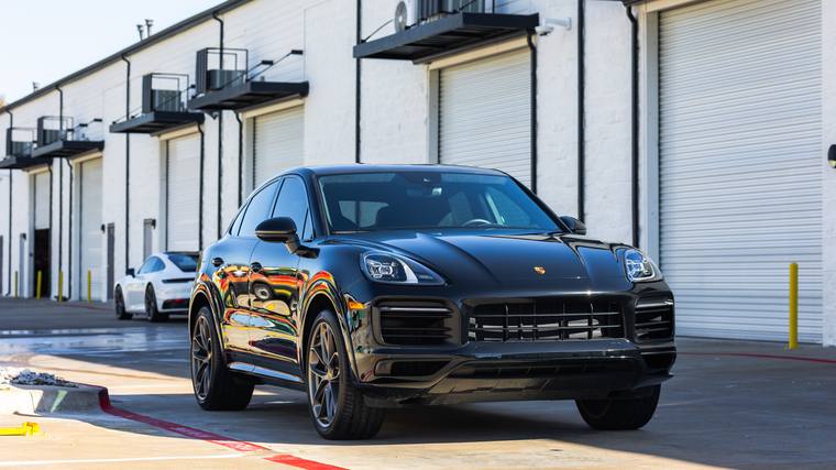 Black Porsche Cayenne Coupe paint protection film, ceramic coating — front three quarter at Humble Crew Auto Spa, Plano TX