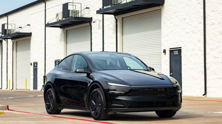 Black Tesla Model Y Juniper paint protection film, ceramic coating — front three quarter at Humble Crew Auto Spa, Plano TX