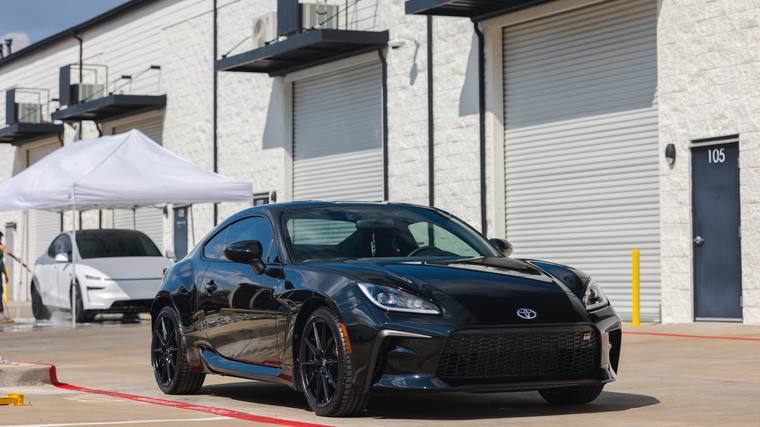 Black Toyota GR86 Premium paint protection film, ceramic coating — front three quarter at Humble Crew Auto Spa, Plano TX