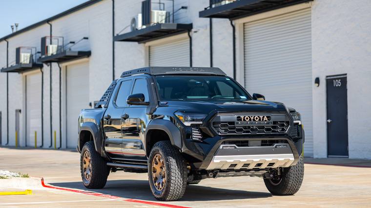 Black Toyota Tacoma Trailhunter paint protection film, ceramic coating — front three quarter at Humble Crew Auto Spa, Plano TX