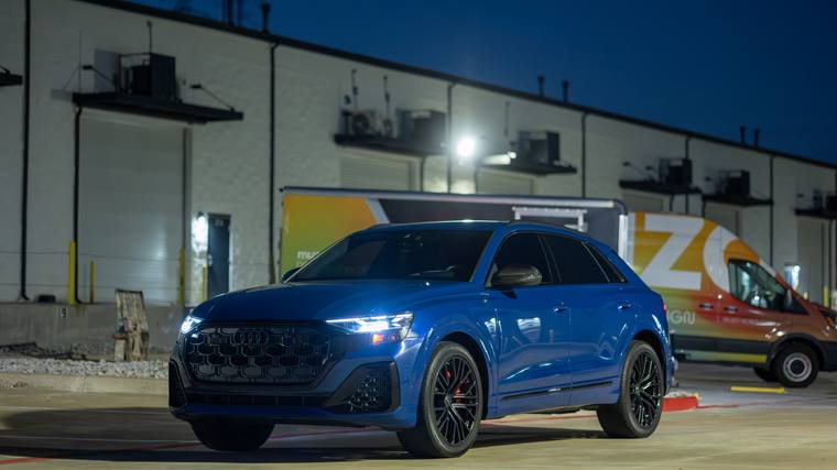 Blue Audi SQ8 paint protection film, ceramic coating — front three quarter night at Humble Crew Auto Spa, Plano TX