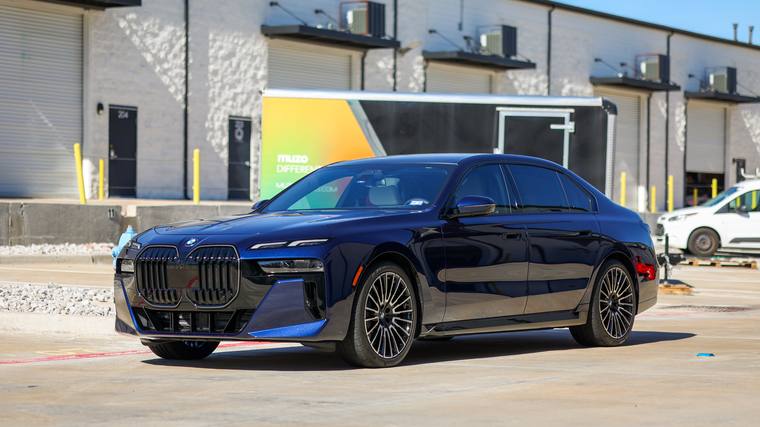 Blue BMW 7 Series ceramic coating, paint correction — front three quarter at Humble Crew Auto Spa, Plano TX