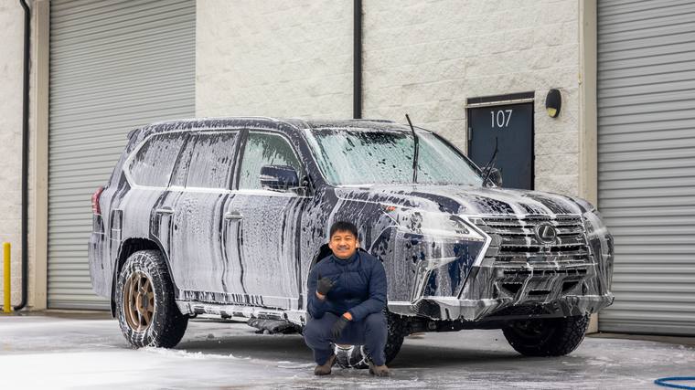 Blue Lexus LX 570 exterior detailing — detail foam covered with detailer at Humble Crew Auto Spa, Plano TX