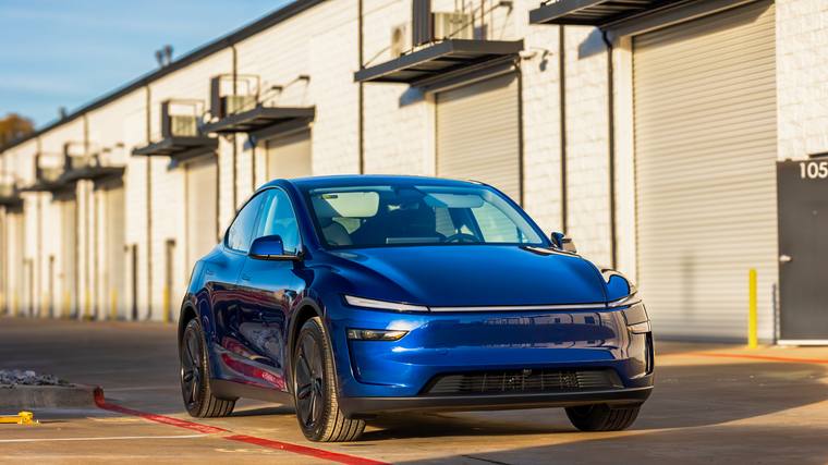 Blue Tesla Model Y Juniper paint protection film, ceramic coating — front three quarter at Humble Crew Auto Spa, Plano TX