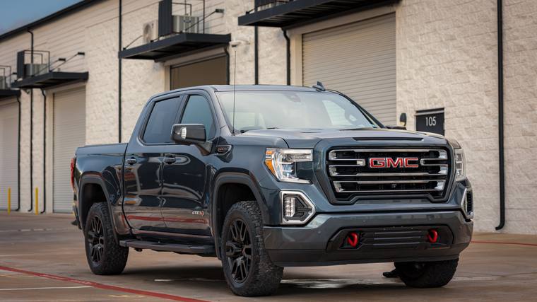 Gray GMC Sierra 1500 AT4 paint protection film, ceramic coating — front three quarter at Humble Crew Auto Spa, Plano TX