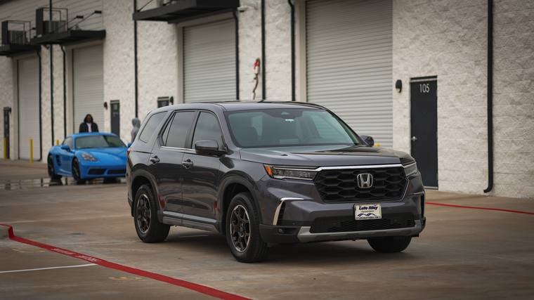 Gray Honda Pilot TrailSport paint protection film, ceramic coating — front three quarter at Humble Crew Auto Spa, Plano TX