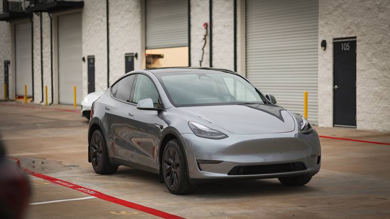 Gray Tesla Model Y paint protection film, ceramic coating — front three quarter at Humble Crew Auto Spa, Plano TX
