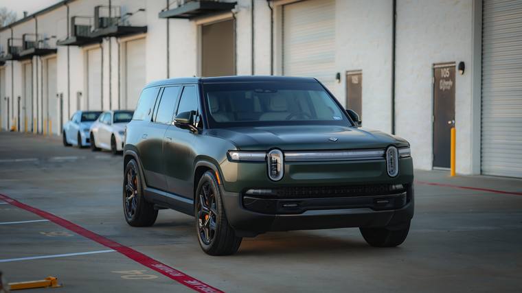 Green Rivian R1S paint protection film, ceramic coating — front three quarter at Humble Crew Auto Spa, Plano TX