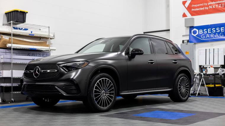 Matte Black Mercedes-Benz GLC 300 ceramic coating — front three quarter in shop at Humble Crew Auto Spa, Plano TX