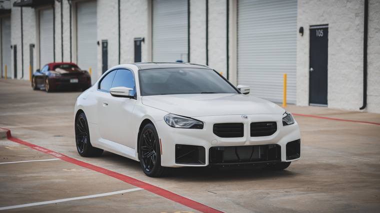 Matte White BMW M2 G87 paint protection film — front three quarter at Humble Crew Auto Spa, Plano TX