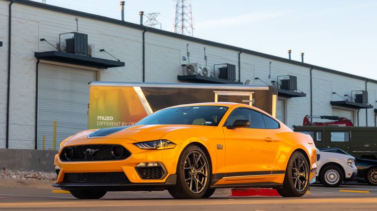 Orange Ford Mustang Mach 1 paint protection film, ceramic coating — front three quarter at Humble Crew Auto Spa, Plano TX