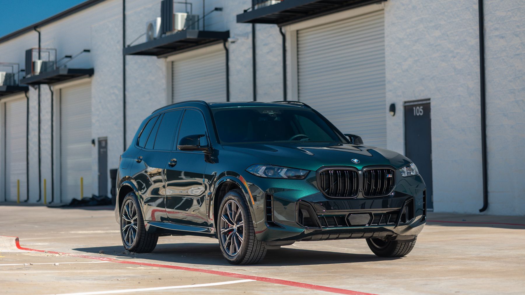 Oxford Green BMW X5 — window tint at Humble Crew Auto Spa