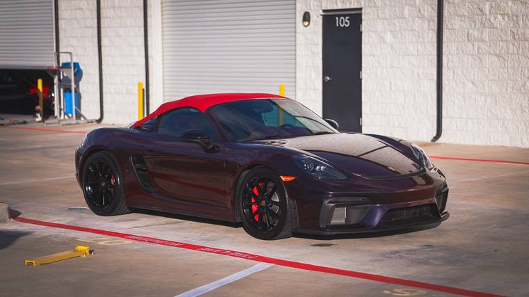 Phoenix Red Porsche 718 Spyder color change PPF — front three quarter at Humble Crew Auto Spa, Plano TX