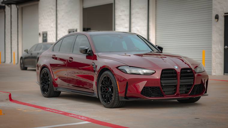 Red BMW M3 G80 Competition paint protection film, ceramic coating — front three quarter at Humble Crew Auto Spa, Plano TX