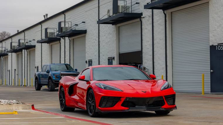 Red Chevrolet Corvette C8 Stingray ceramic coating, paint correction — front three quarter at Humble Crew Auto Spa, Plano TX