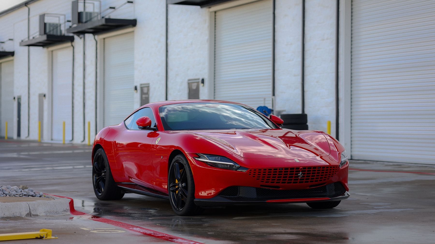 Red Ferrari Roma at Humble Crew Auto Spa in Plano, TX
