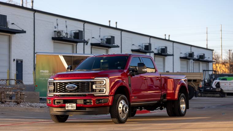 Red Ford F-450 Super Duty Platinum Gold ceramic coating — front three quarter at Humble Crew Auto Spa, Plano TX
