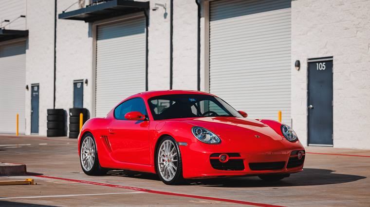 Red Porsche Cayman S 987 ceramic coating — front three quarter at Humble Crew Auto Spa, Plano TX