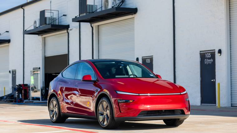 Red Tesla Model Y Juniper paint protection film, ceramic coating — front three quarter at Humble Crew Auto Spa, Plano TX