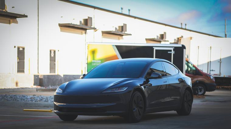 Stealth Gray Tesla Model 3 Highland paint protection film — front three quarter at Humble Crew Auto Spa, Plano TX