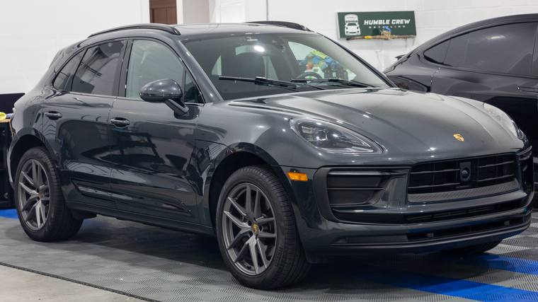 Volcano Gray Porsche Macan T paint protection film, ceramic coating — front three quarter in shop at Humble Crew Auto Spa, Plano TX