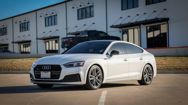 White Audi A5 Sportback ceramic coating — front three quarter at Humble Crew Auto Spa, Plano TX