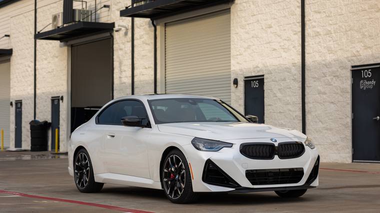 White BMW M240i ceramic coating — front three quarter at Humble Crew Auto Spa, Plano TX