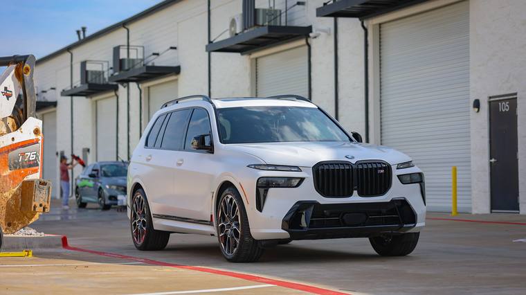 White BMW X7 M60i paint protection film, ceramic coating — front three quarter at Humble Crew Auto Spa, Plano TX